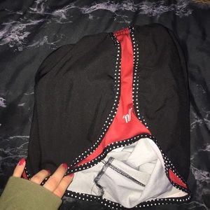 cheer shorts. black and red.